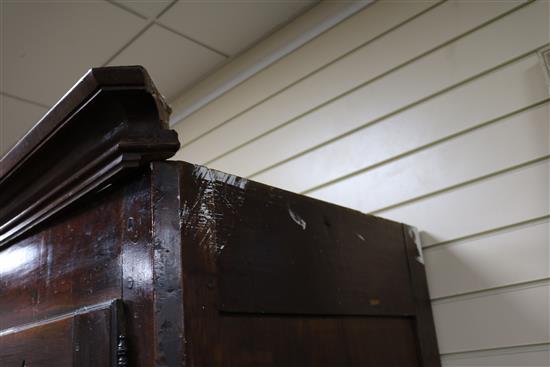An 18th century French fruitwood armoire W.150cm